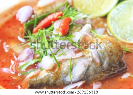 Blurred background of Sardines fish in tomato sauce, canned fish