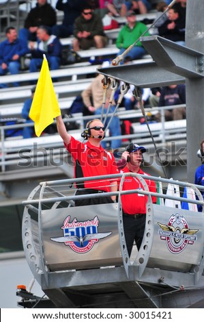 Auto Racing  Rules  Yellow Flag on Indianapolis  In   May 9  Flag Man Of Indy 500 Waves Yellow Flag