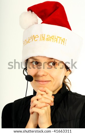 beautiful christmas girl with mic and red hat