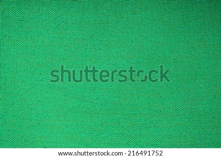 green fabric texture with vignette filter
