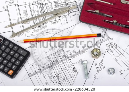 Mechanical parts drawing by designer with technical drawing tools, screw, nut, on blueprint backgrounds