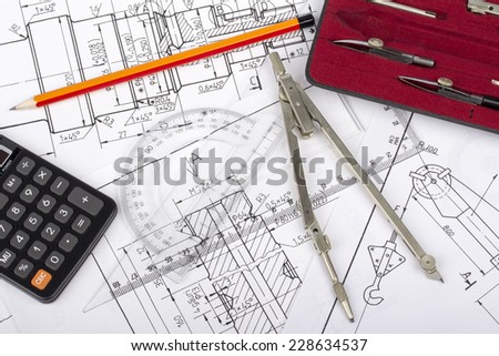 Mechanical parts drawing by designer with technical drawing tools on blueprint backgrounds