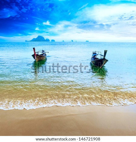 Travel boat on Thailand island beach. Tropical coast Asia landscape background