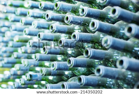Rows of many empty wine bottles. Abstract texture background