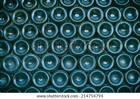 Abstract texture background of wine bottles rows