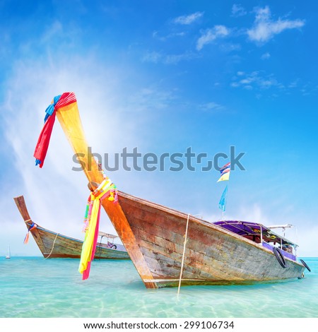 Traditional wooden boat in Thailand near Phuket island. Adventure trip background
