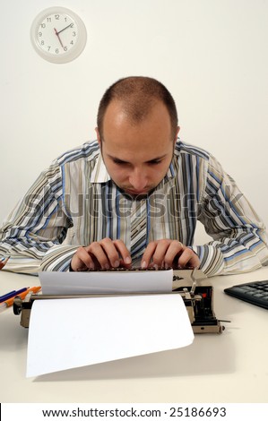 Man typing on old typewriter