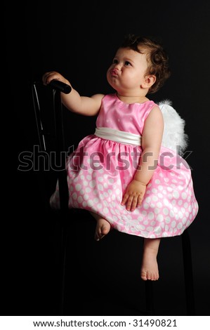 baby girl angel. stock photo : A aby girl