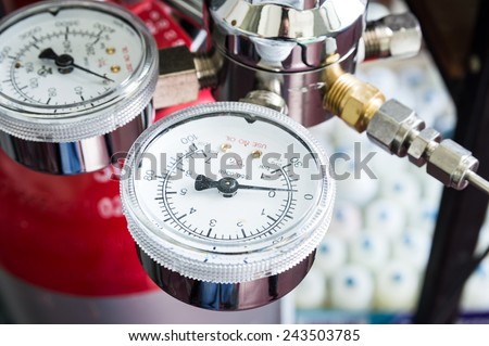 Pressure gauge on a gas regulator of a gas tank in a laboratory