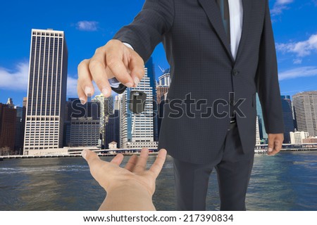 Car Key with business building
