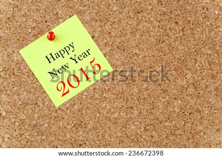 Happy New Year 2015 on Paper Note on texture background