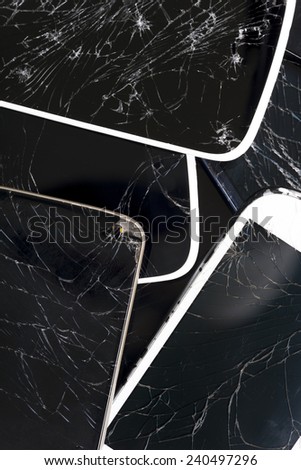 smartphones with broken screen isolated on white background.