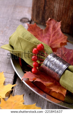napkin ring on a platter autumn still life