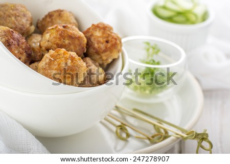 Minced meat ball in white bowl, selective focus