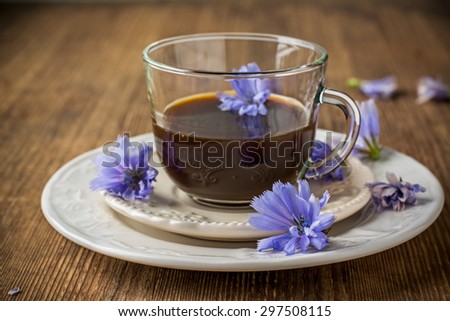 Chicory flowers and tea from chicory. Selective focus