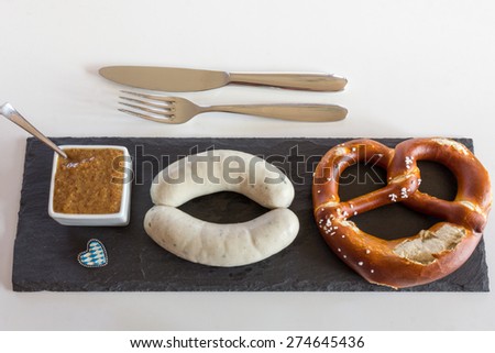 Veal sausage and pretzels - a snack with heart