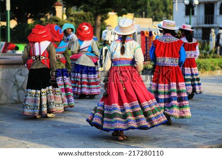 Yanque, Peru - ?? April, 17 2014 :  Peruvian children in traditional dress dancing in Plaza de Armas, Yanque village, near Colca Canyon Peru.