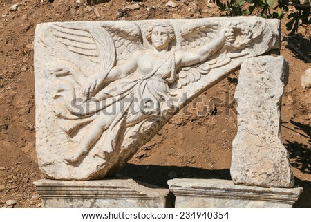 Sculpture of the god Nike in the archaeological site of ancient roman city Ephesus, Turkey