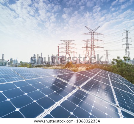Solar energy modern electric power production in gas and oil industry plant, renewable energy concept.