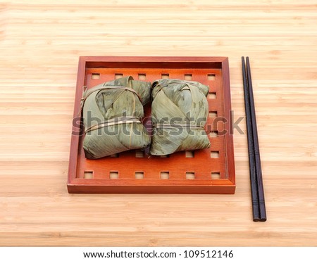 Chinese rice dumplings (zongzi) wrapped in bamboo leaves,Chinese rice pudding