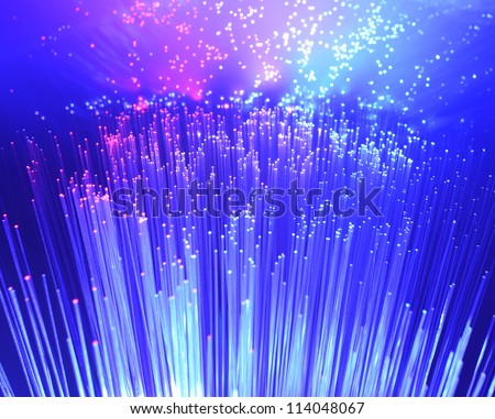 bunch of optical fibres dinamic flying from deep on technology background