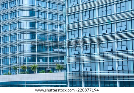 Contemporary office building blue glass wall detail