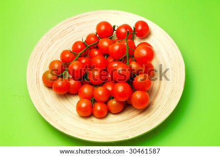 Cherry Tomato and a bunch of them. Look at my gallery for more fresh fruits