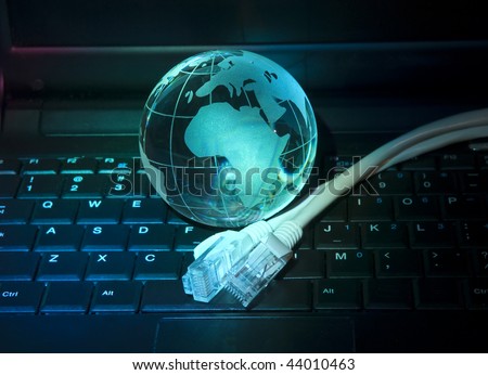 hi-tech earth globe against fiber optic background