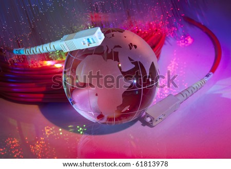 globe with network on technology fiber optics background