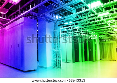 shot of network cables and servers in a technology data center