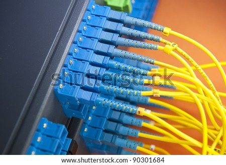 network server room with fiber optic hub for digital communications and internet