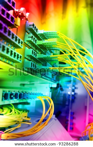 fiber network cables and servers in a technology data center