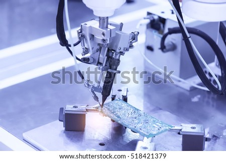 PCB Processing on CNC machine working in factory