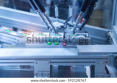 Automatic robot in assembly line working in factory. Smart factory industry 4.0 concept.