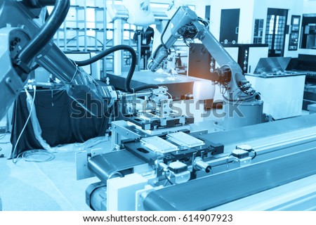 industrial machine and factory robot arm,Smart factory industry 4.0 concept.