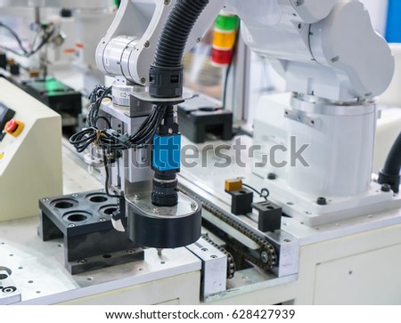 robot arm with Visual measuring system,Smart factory industry 4.0 concept.