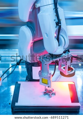 Robotic machine vision system in factory,automated scanning.