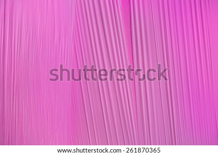 Pattern of a pink foil with taut, slightly corrugated surface