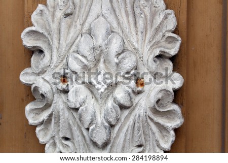 With ornament of entry. Antique ornament. Luxury wooden furniture with natural wood.
