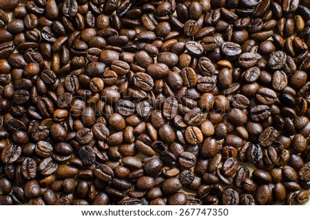 Roasted brown coffee beans, can be used as a background