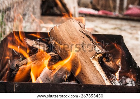 ashes in an iron box, barbecue, fire