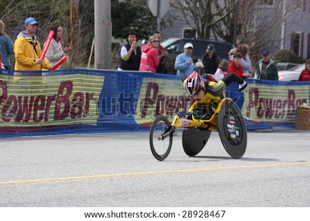 BOSTON - APRIL 20 : Women\'s wheelchair winner Wakako  Tsuchida (JPN) races up Heartbreak Hill during the Boston Marathon before winning the women\'s race April 20, 2009 in Boston.