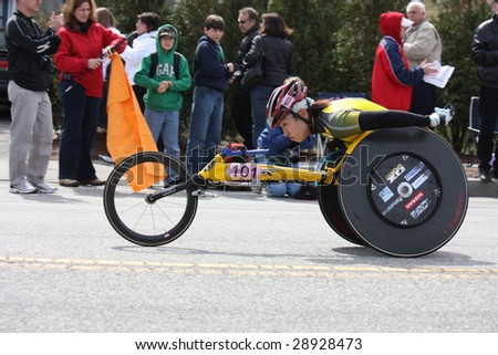BOSTON - APRIL 20 : Women\'s wheelchair winner Wakako  Tsuchida (JPN) races up Heartbreak Hill during the Boston Marathon before winning the women\'s race April 20, 2009 in Boston.