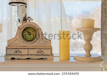 Luxurious vintage old fashioned clock with decorative elements