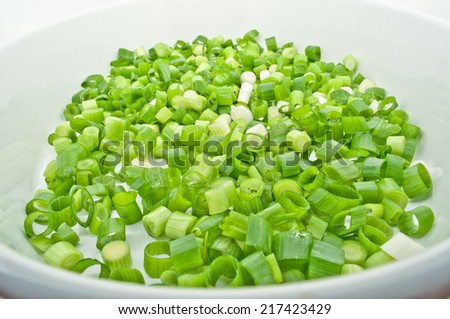 Green Spring Onions In A Baking Dish