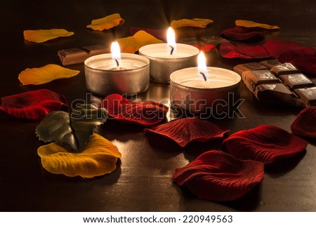 Romantic Candlelight With Chocolate and Rose Petals