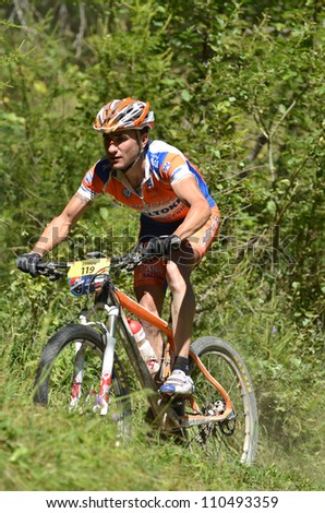 EVOLENE, SWITZERLAND  AUGUST 18:  Ramon Sagues Portabella (SPA) 16th placed in the world famous Grand Raid mountain bike race:  August 18, 2012 in Evolene Switzerland