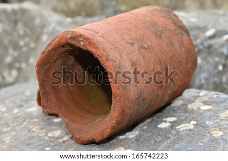 section of ancient roman clay water pipe
