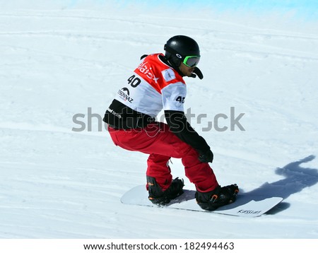VEYSONNAZ, SWITZERLAND - MARCH 11: Marvin JAMES (SUI) competing in the Snowboard Cross World Cup: March 11, 2014 in Veysonnaz, Switzerland
