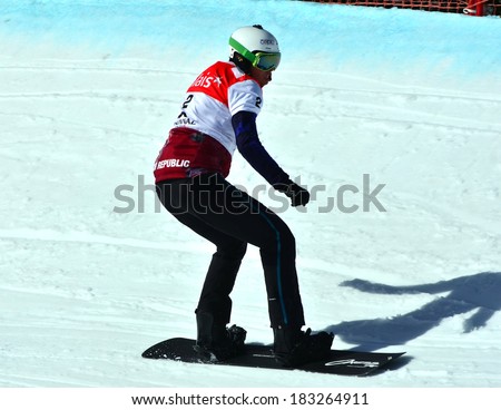 VEYSONNAZ, SWITZERLAND - MARCH 11: David BAKES (CZE) competing in the Snowboard Cross World Cup: March 11, 2014 in Veysonnaz, Switzerland